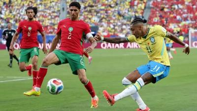 المؤتمر نت - أفلت المنتخب المغربي بنقطة التعادل 1 - 1 مع نظيره البرازيلي فجر اليوم في الجولة الأولى من دور المجموعات في كأس العالم 2026